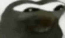 a blurred image of an apple logo on a white surface