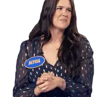 a woman wears a name tag that says alyssa