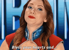 a woman in a red top says bless your hearts