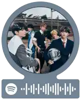 a group of young men are standing next to each other in a circle