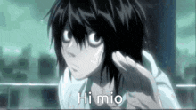 a close up of a person 's face with the words hi mio written on it .