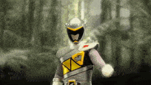 a gray and yellow power ranger with a lion on his chest