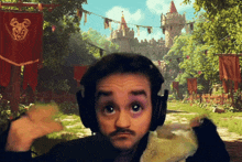 a man wearing headphones and holding a shoe in front of a castle