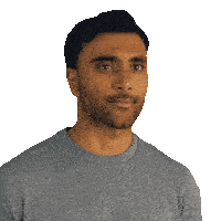 a man with a beard is wearing a gray shirt