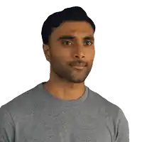 a man with a beard is wearing a gray shirt