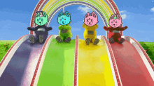 a group of stuffed animals are sitting on a slide with a rainbow in the background