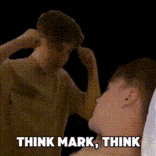 a man scratching his head with the words think mark think
