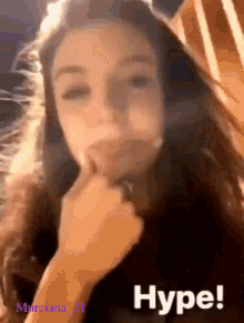 a girl with a hand on her chin and the words hype written on the bottom