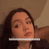 a close up of a woman 's face with a caption that says lalalalalalalalalalalalala