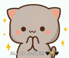 a cartoon cat is smiling and saying all da smilez .