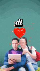 a man and a woman are looking at a tablet with a heart above them that says " di "