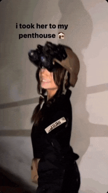 a woman wearing a helmet with julian on the sleeve