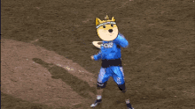 a man wearing a blue shirt that says doper tires is standing in the dirt