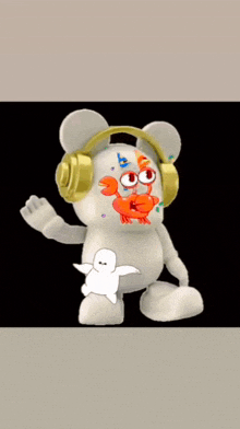 a stuffed animal wearing headphones with crabs on it