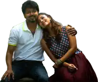 a man and a woman are sitting next to each other with the woman leaning on the man 's shoulder