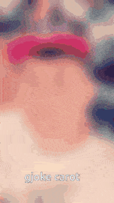 a close up of a person 's face with the words " gjoke carrot " on the bottom