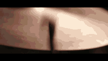 a close up of a drum cymbal with a blurred background
