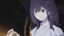 a girl with purple hair is smiling while holding a piece of pizza