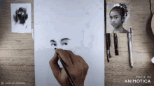 a person is drawing a girl 's face with a pencil on a piece of paper that says made in animotica