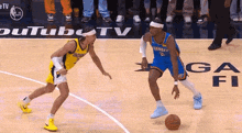 two men are playing basketball on a court and one of them is wearing a yellow jersey .