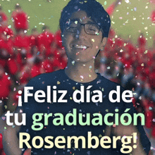 a man is smiling in front of a sign that says feliz dia de tu graduacion rosenberg