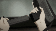 a woman with black nails is holding a gun with the number 7 on her wrist