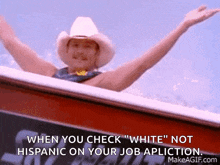a man in a cowboy hat is sitting on a boat with his arms outstretched