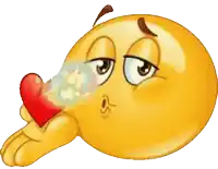a cartoon smiley face is holding a red heart