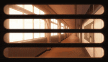 a hallway with a few windows and a door that says ' a '