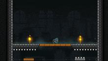 a video game is being played in a dark room with bricks and candles
