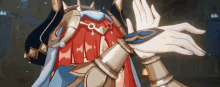a close up of a person 's hands in a video game with armor on .