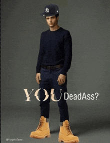 a picture of a man wearing a ny hat and boots with the caption " you dead ass "