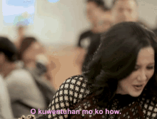 a woman says " o kuwentuhan mo ko how " in front of a crowd of people