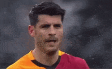 a close up of a soccer player 's face