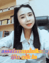 a woman sitting at a desk with the words assalamualaikum fijin cck n on the bottom