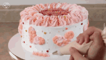 pink icing icing on the cake add icing decorate cake dessert