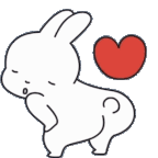 a white rabbit with a red heart behind it .