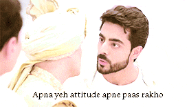 a man with a beard talks to another man with the words apna yeh attitude apne paas rakho