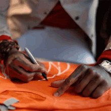 Autograph Kevin Gates GIF - Autograph Kevin Gates Signing GIFs