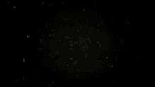 a black background with a lot of small white dots on it