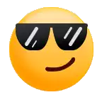 a smiley face wearing sunglasses and giving a thumbs up .