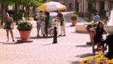 a man selling ice cream from a cart that says ice cream