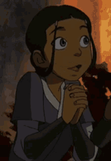 a close up of a cartoon character with her hands folded in front of her face .