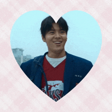 a man wearing a shirt that says ' jaws ' on it is in a heart shaped frame