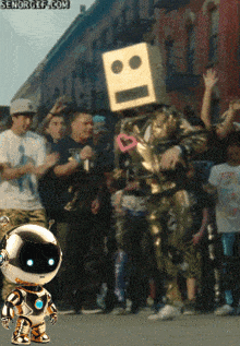 a robot with a cardboard box on its head is dancing in front of a crowd