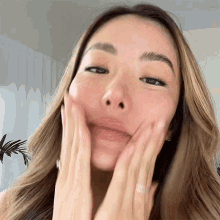 Massaging My Face Cina GIF - Massaging My Face Cina Face Cleanse GIFs