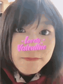 a close up of a girl 's face with the words `` lovely valentine '' written on her face .