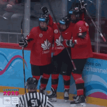 Hugging Team Canada GIF - Hugging Team Canada Well Done GIFs