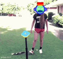 a girl wearing a cedar soft shirt stands in front of a bat