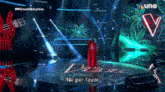 a woman in a red cape singing on a stage with the words no por favor on the bottom